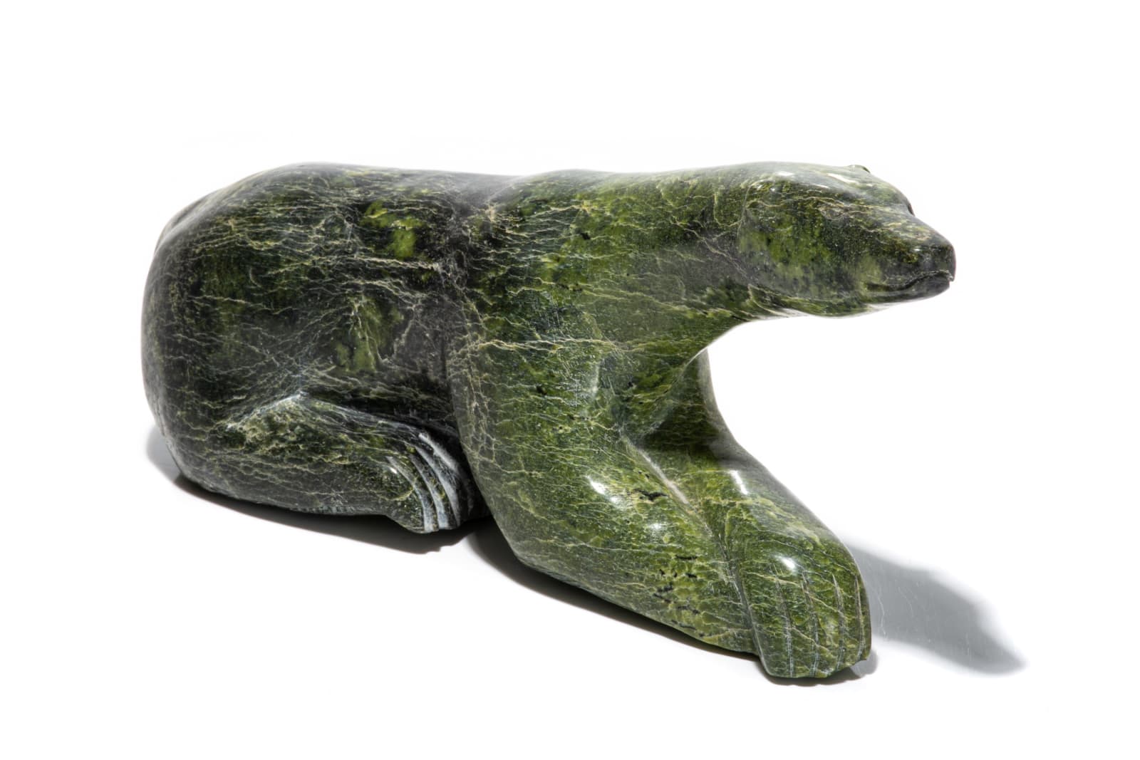 TEETEE CURLEY (1958-) KINNGAIT (CAPE DORSET), Polar Bear in Repose