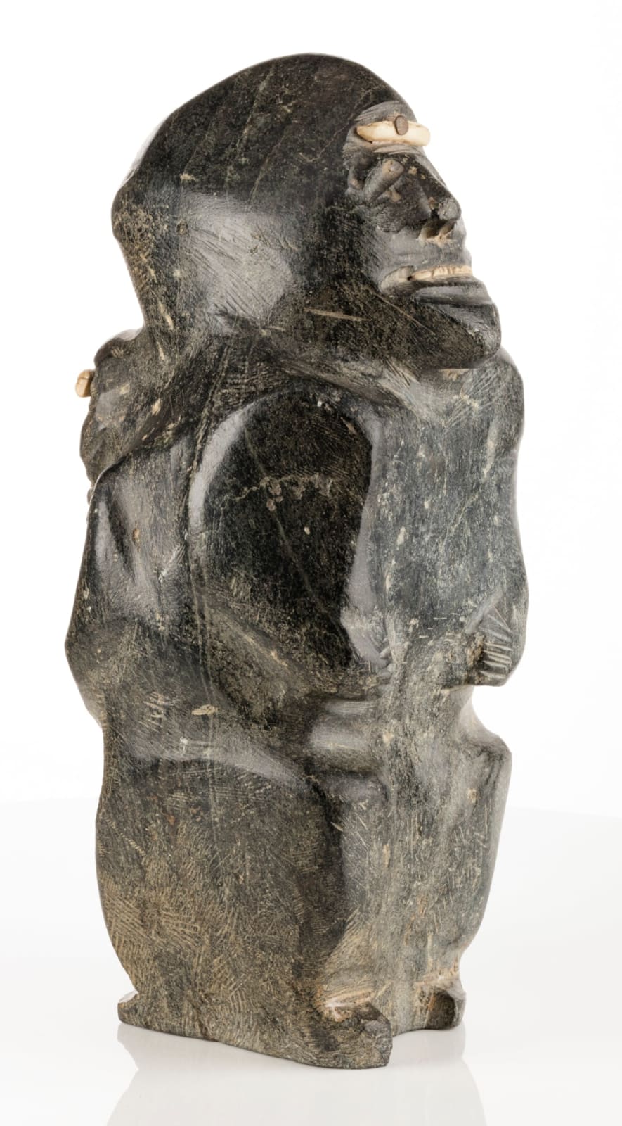 JOHN KAVIK (1897-1993) KANGIQLINIQ (RANKIN INLET), Father and Son Wearing Snow Goggles , c. 1960s