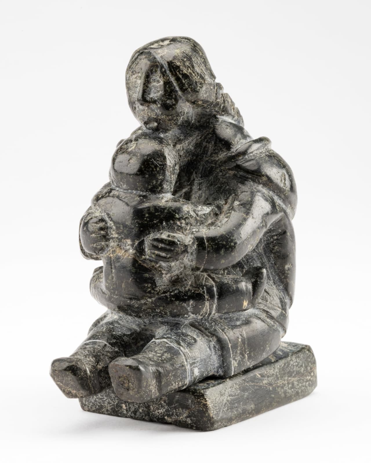 ENNUTSIAK (1893-1967) IQALUIT (FROBISHER BAY), Grandmother With Child, late 1950s or early 1960s