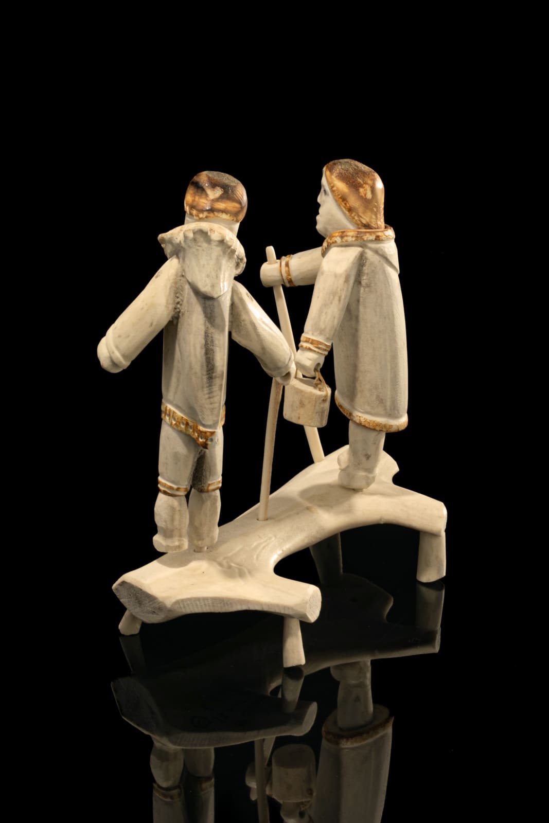 ROMEO EEKERKIK (1923-1983) ARVIAT (ESKIMO POINT), Man and Woman Walking, 1975