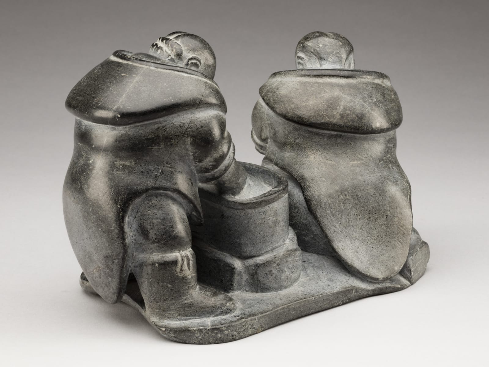JUANISIALU IRQUMIA (1912-1977) m., PUVIRNITUQ (POVUNGNITUK), Two Women Preparing Skins, 1958-60