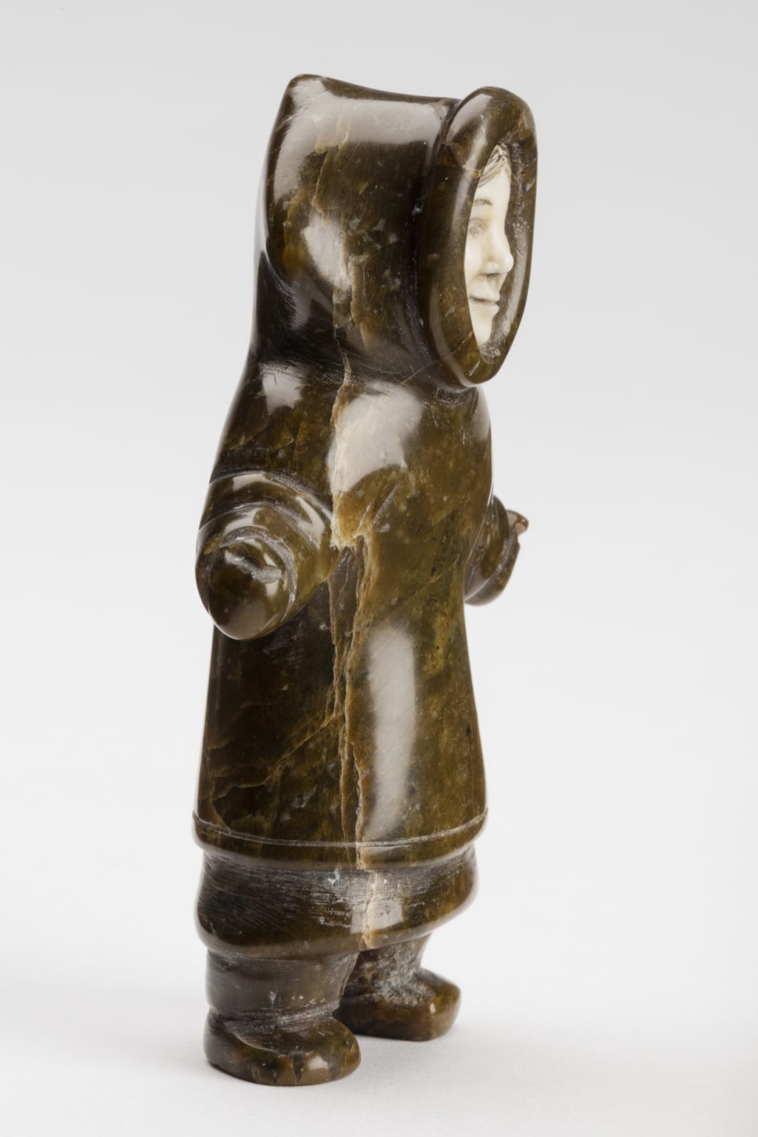 SHEOKJUK OQUTAQ (1920-1982) KINNGAIT (CAPE DORSET), Young Girl, c. 1954-5