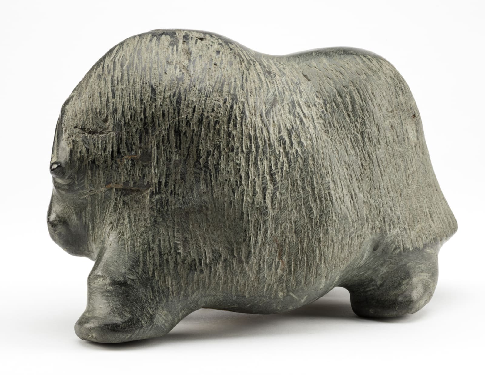 BARNABUS ARNASUNGAAQ (1924-2017) QAMANI'TUAQ (BAKER LAKE), Running Muskox, mid-1970s