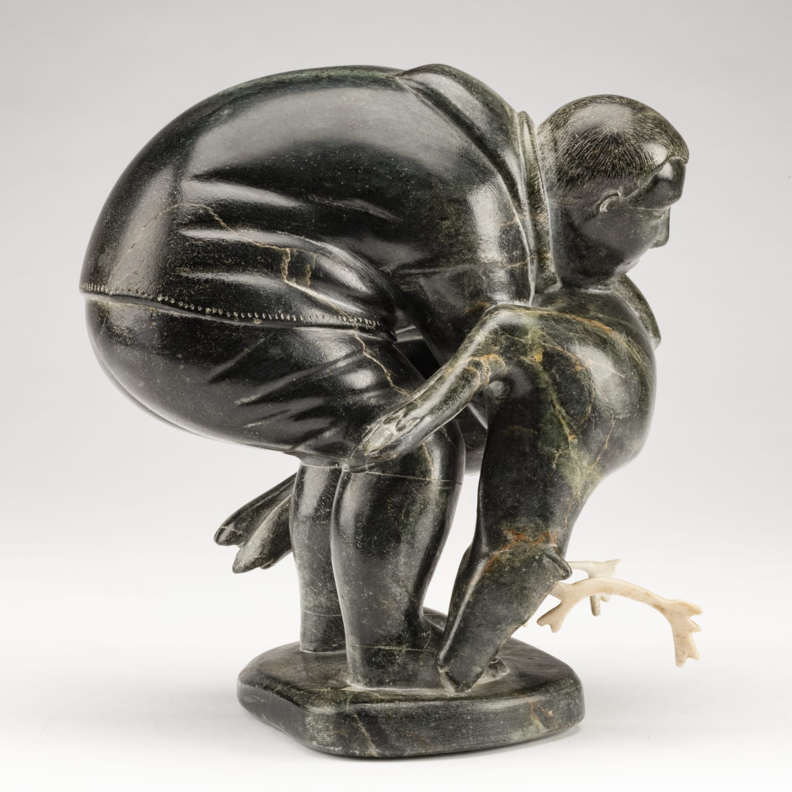 SAMISA PASSAURALU IVILLA (1924-1995) m., PUVIRNITUQ (POVUNGNITUK), Hunter Carrying a Caribou, c. 1958