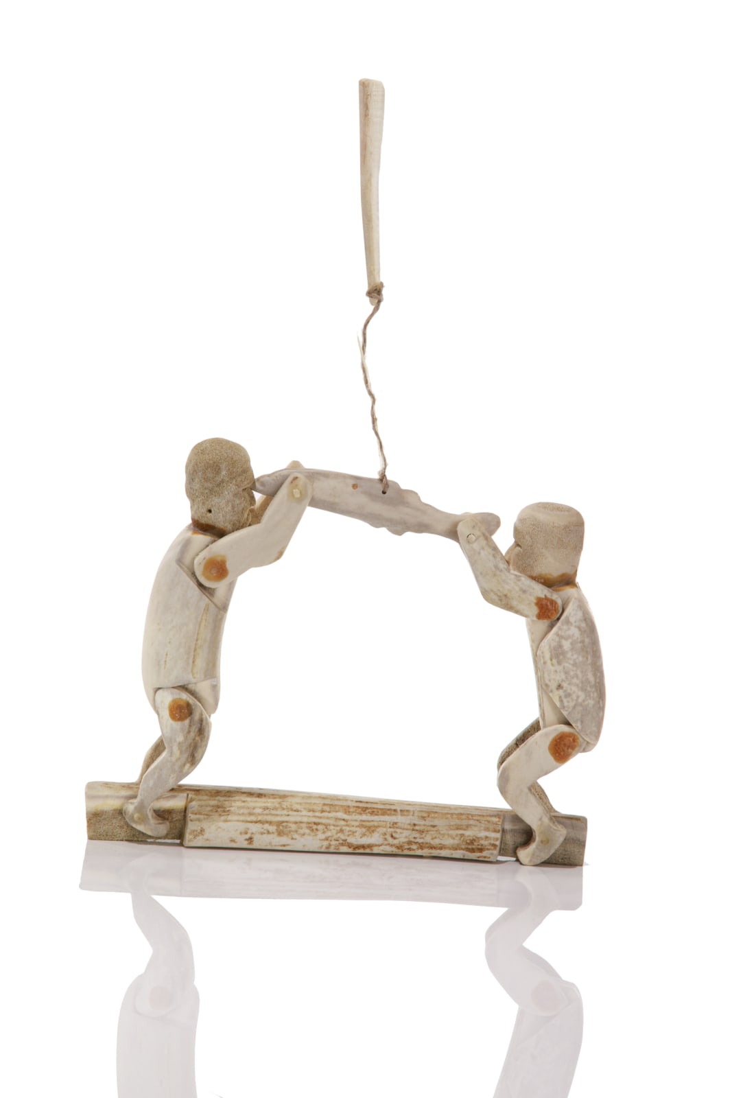 UNIDENTIFIED ARTIST, QAMANI'TUAQ (BAKER LAKE), Two Men Fighting over a Fish (Articulated Figures), early-mid 1970s