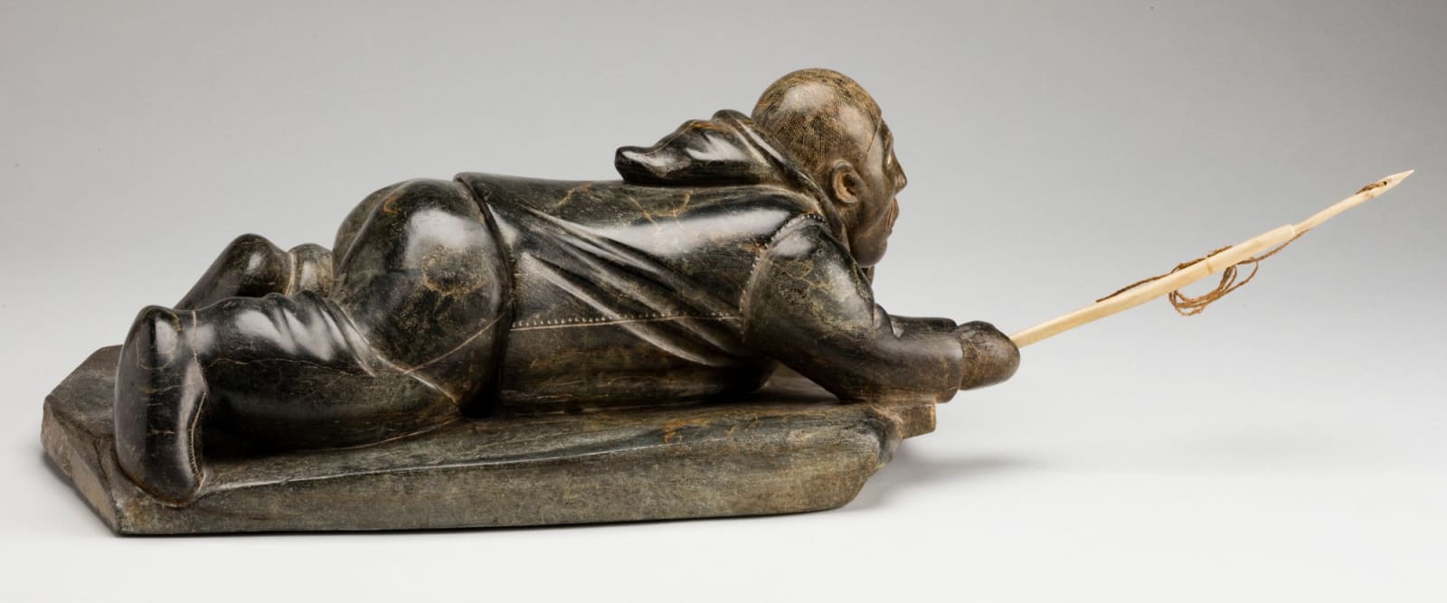 ISAH QUMALU SIVUARAPI (1925-1979) PUVIRNITUQ (POVUNGNITUK), Crawling Hunter with Harpoon and Line, late 1950s