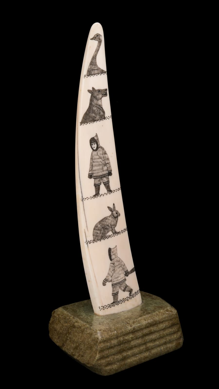 DAVIDEE ITULU (1929-2006) KIMMIRUT (LAKE HARBOUR), Incised Tusk with Inuit and Arctic Animals, mid-late 1970s