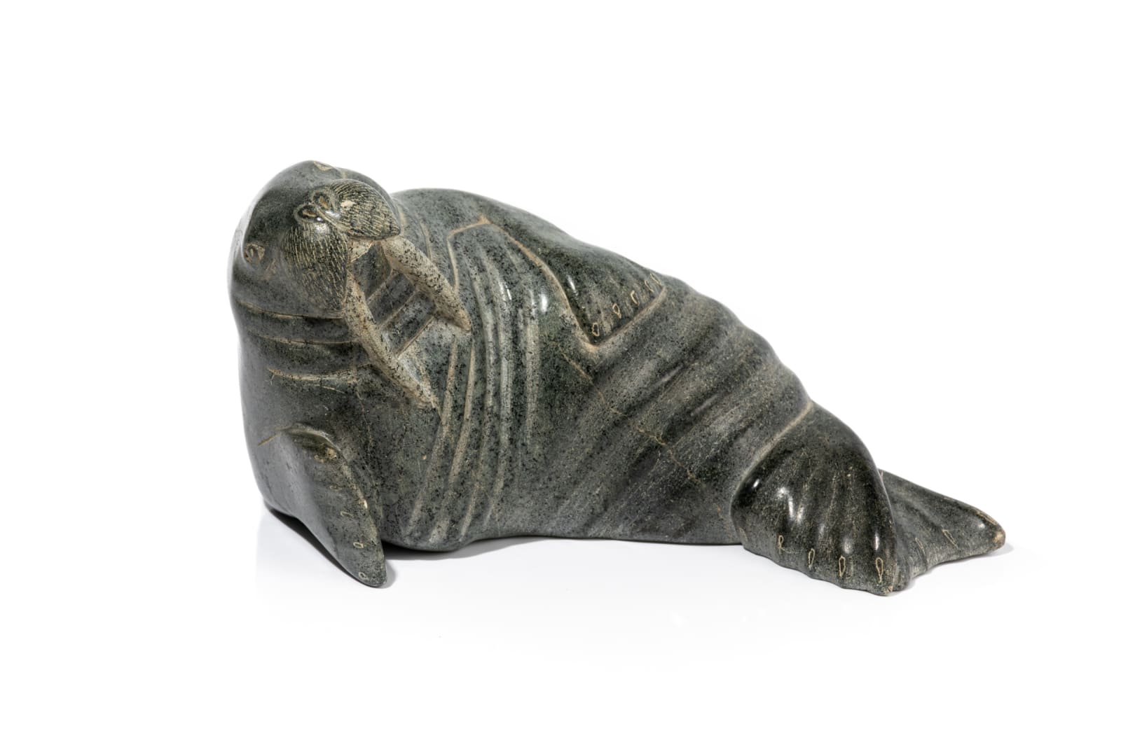 LEVI QUMALUK (1919-1997) PUVIRNITUQ (POVUNGNITUK), Basking Walrus