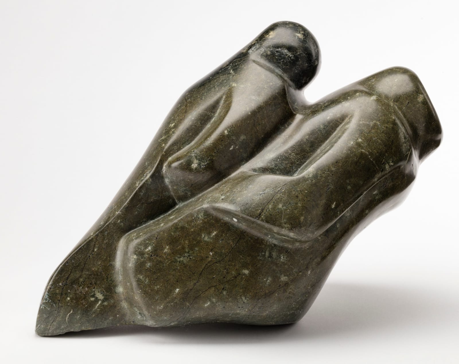 TUKIKI OSUITOK (1952-) KINNGAIT (CAPE DORSET), Two Figures, c. 1975