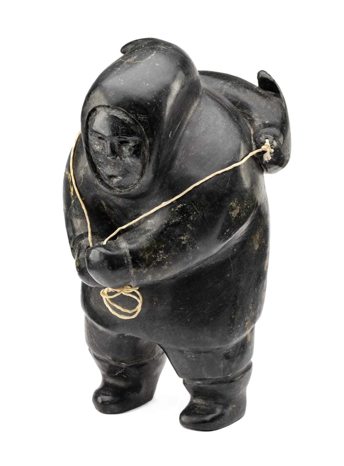 AKEEAKTASHUK (1898-1954) INUKJUAK (PORT HARRISON), Hunter Carrying a Captured Seal, c. 1951-53