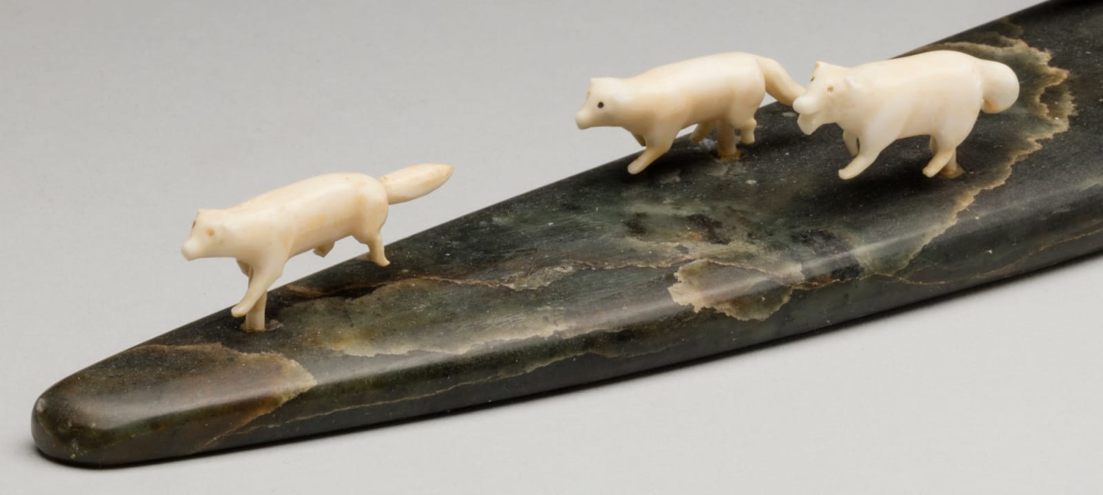 UNIDENTIFIED ARTIST, INUKJUAK (PORT HARRISON), Hunter Seated on a Qamutiq (Dog Sled), early-mid 1950s