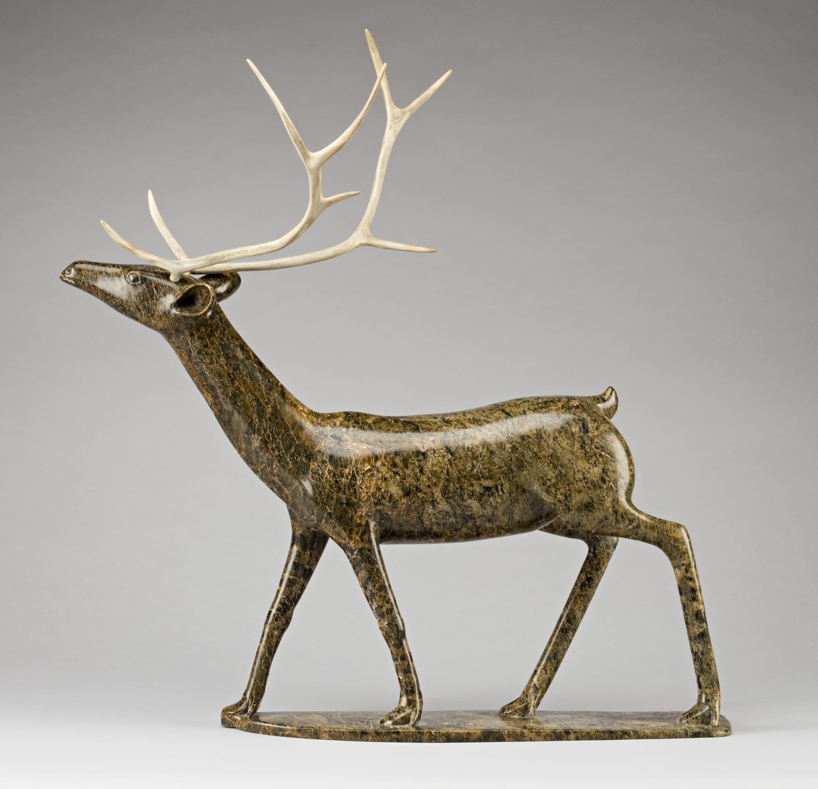 OSUITOK IPEELEE, R.C.A. (1922 or 1923-2005) KINNGAIT (CAPE DORSET, Walking Caribou, c. 1987-88