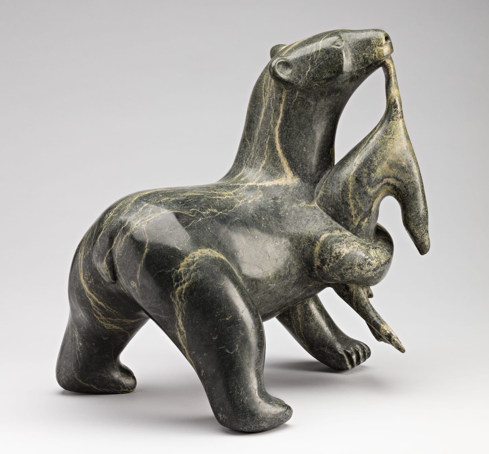 OSUITOK IPEELEE, R.C.A. (1922 or 1923-2005) KINNGAIT (CAPE DORSET, Polar Bear with Captured Seal, 1984