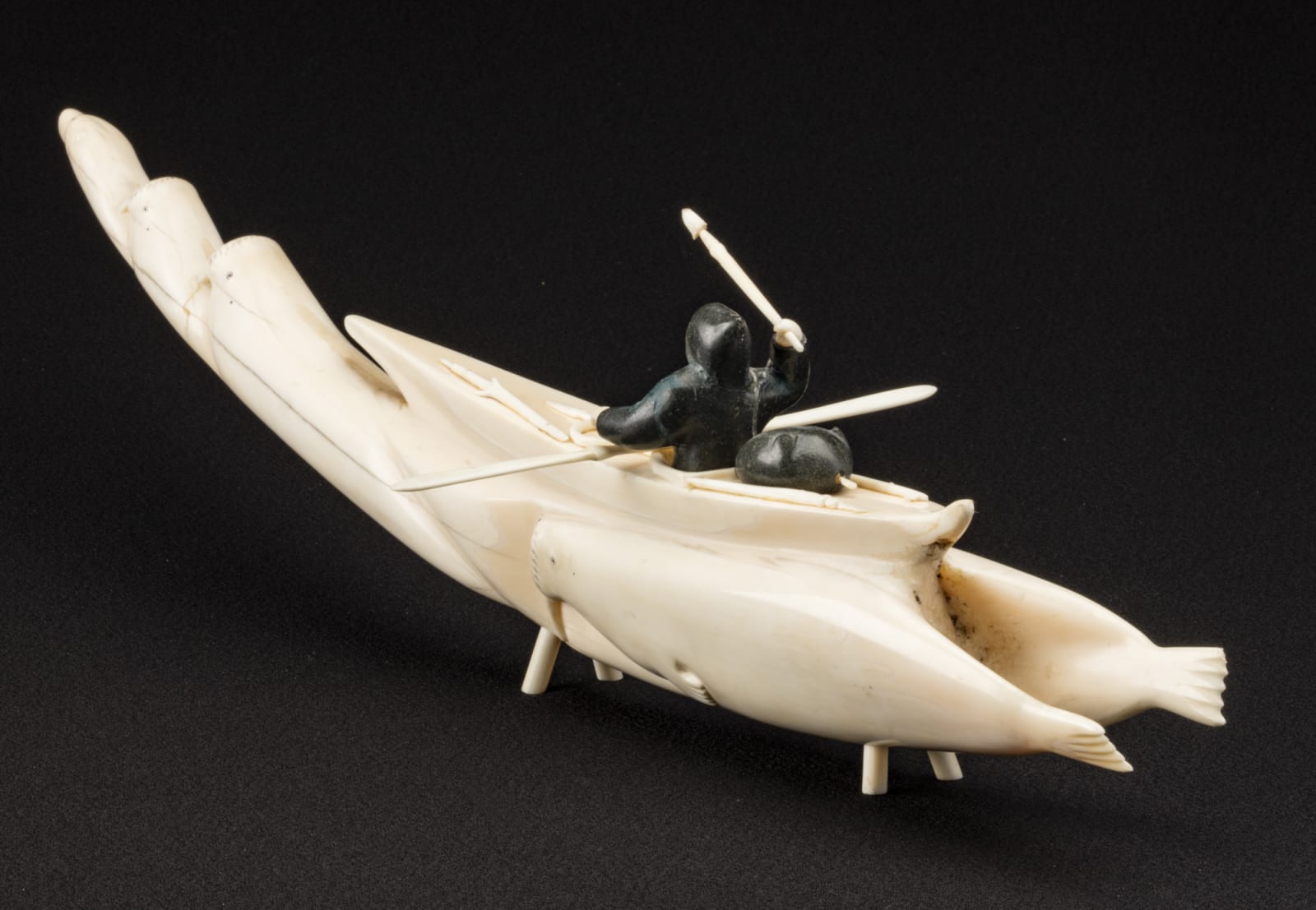 UNIDENTIFIED INUIT ARTIST, EASTERN CANADIAN ARCTIC, Hunting By Kayak