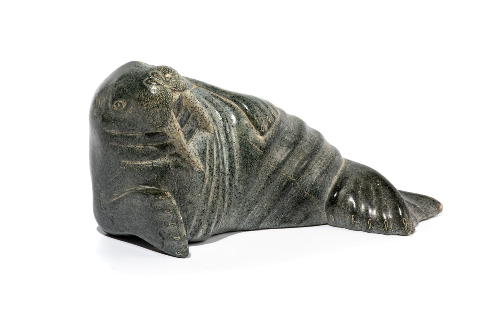 LEVI QUMALUK (1919-1997) PUVIRNITUQ (POVUNGNITUK), Basking Walrus