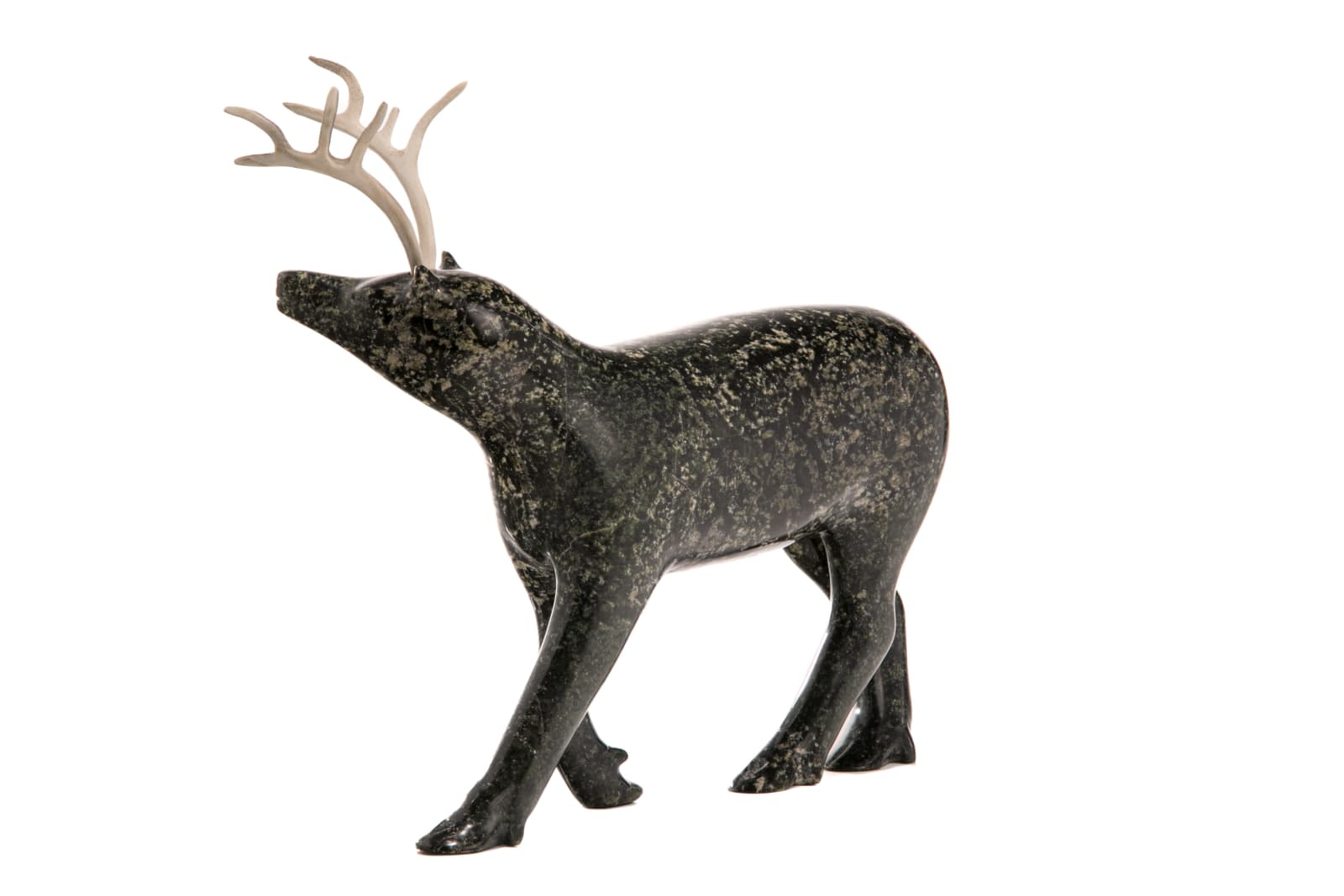 PITSEOLAK NIVIAQSI R.C.A. (1947-2015) KINNGAIT (CAPE DORSET), Strutting Caribou, late 1990s
