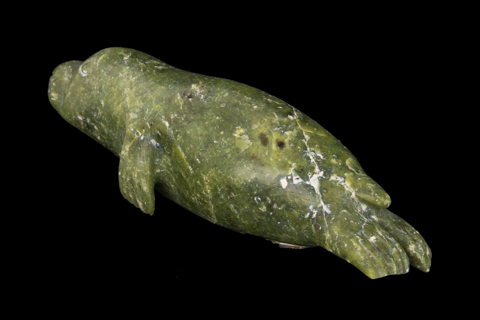 KEELEEMEEOOMEE SAMUALIE (1919-1983) KINNGAIT (CAPE DORSET), Swimming Seal, 1980s