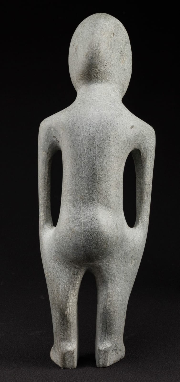 JOHN TIKTAK, R.C.A. (1916-1981) KANGIQLINIQ (RANKIN INLET), Standing Man, c. 1966-67
