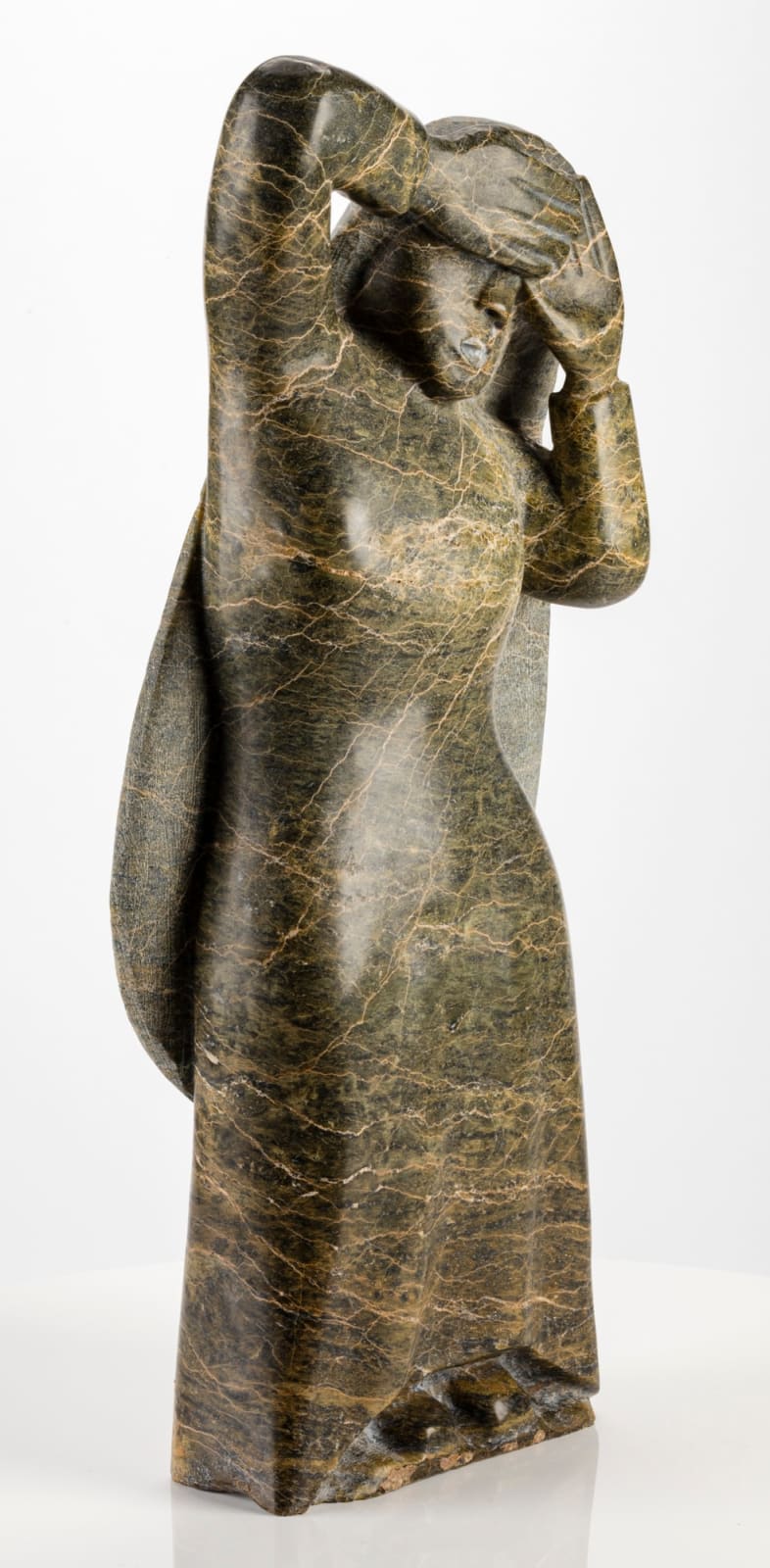 OVILOO TUNNILLIE, R.C.A. (1949-2014) KINNGAIT (CAPE DORSET), Woman Covering Her Face, c. 2000