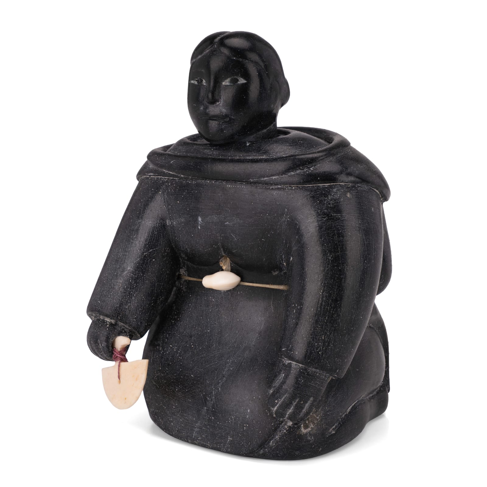 POSSIBLY AISA QUPIRUALU ALASUA (1916-2003) PUVIRNITUQ (POVUNGNITUK), Kneeling Woman with Ulu, early-mid 1960s