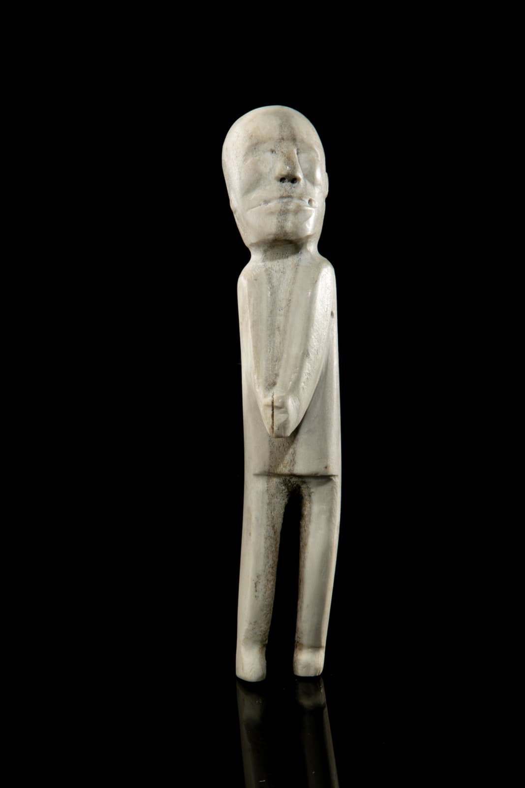 JACOB ITKELIK (1923-D) QAMANI'TUAQ (BAKER LAKE), Standing Man with Clasped Hands, mid 1960s