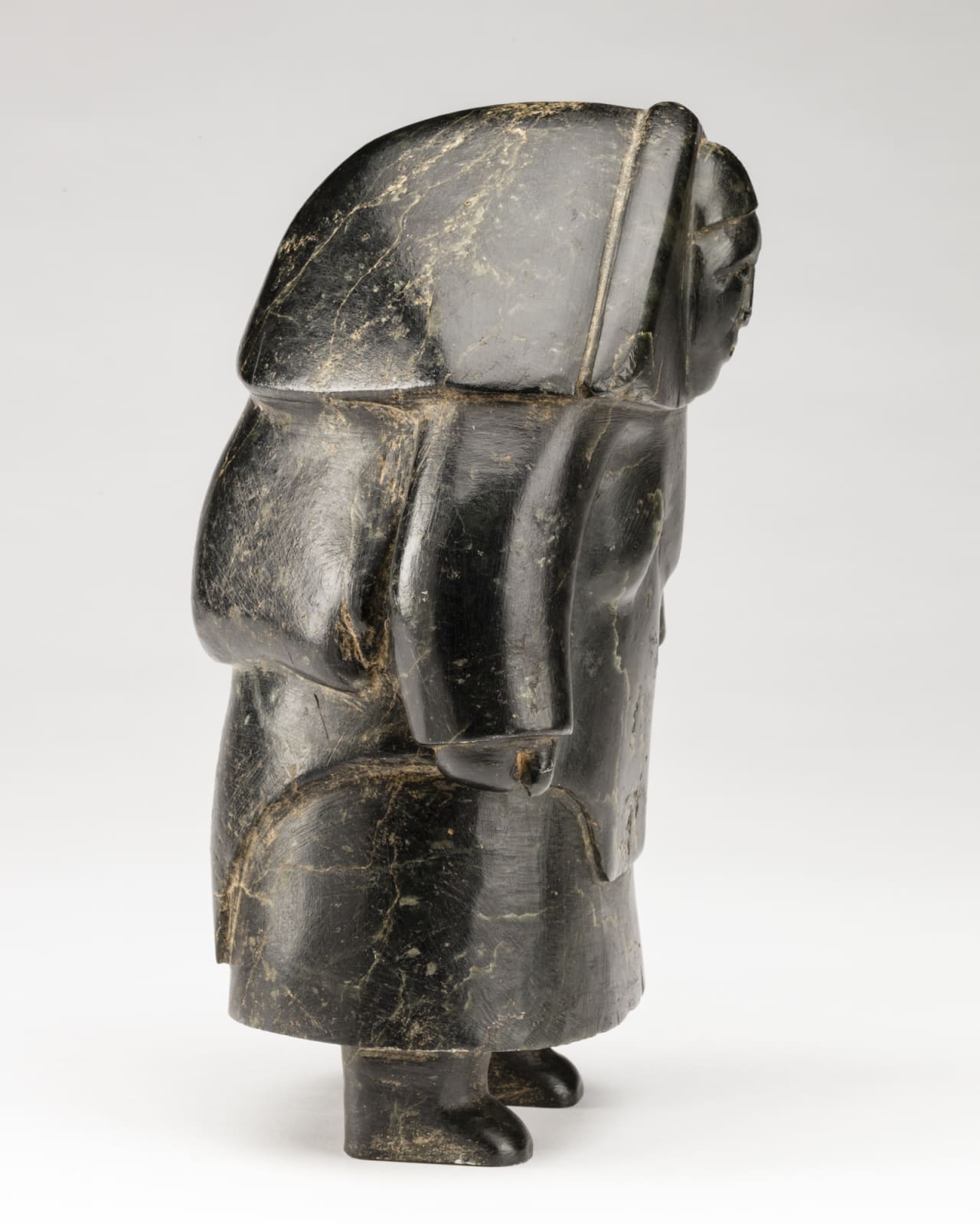 CONLUCY NAYOUMEALOOK (1891-1958) INUKJUAK (PORT HARRISON), Standing Woman in an Amautiq, mid-1950s