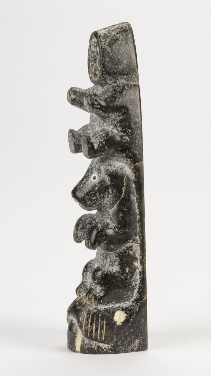 ISA OOMAYOUALOOK (1915-1976) INUKJUAK (PORT HARRISON), Totemic Composition with Walrus, Bear and Man, c. 1951