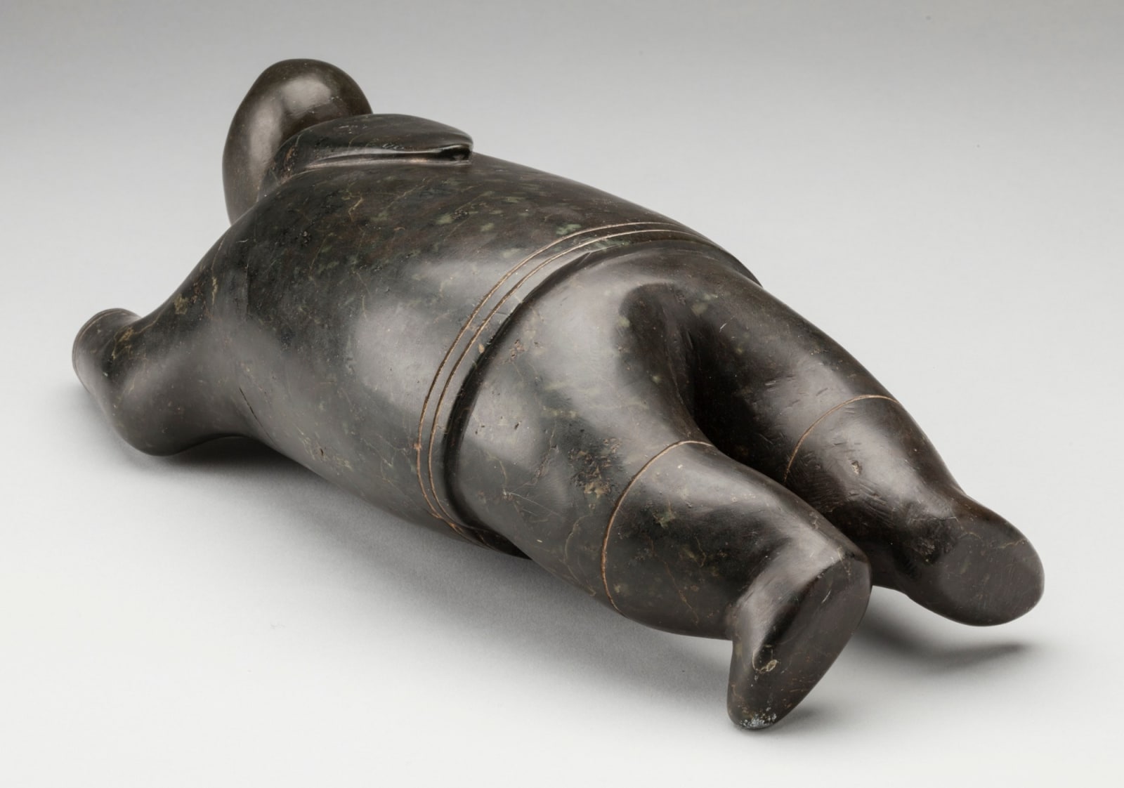 Attributed to JOHNNY INUKPUK, R.C.A (1911-2007) INUKJUAK (PORT HARRISON), Crawling Hunter with Knife and Spear, c. 1952