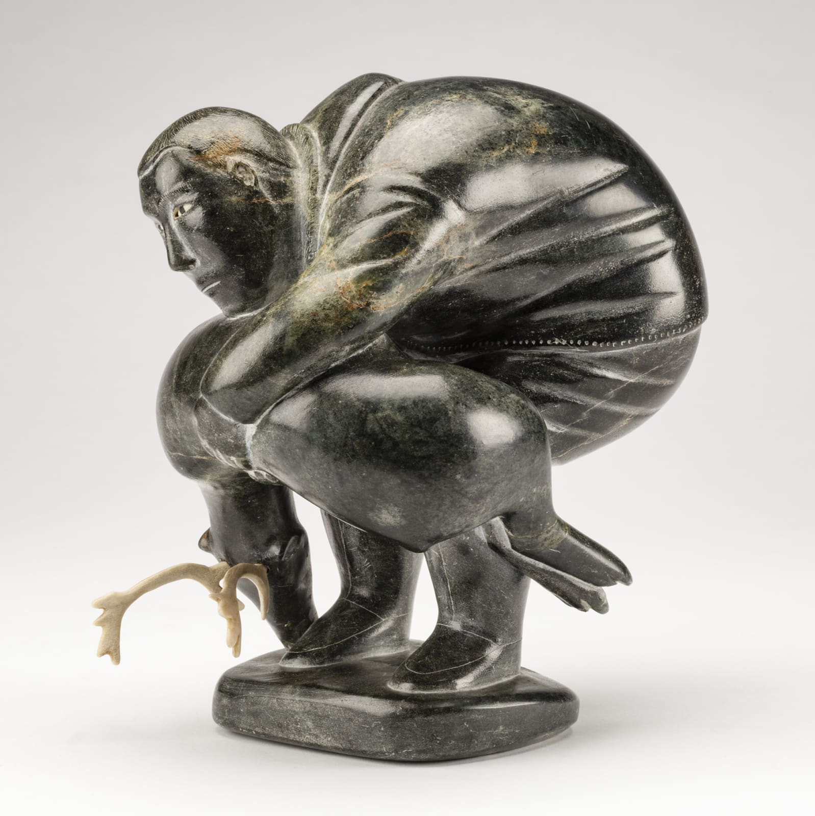 SAMISA PASSAURALU IVILLA (1924-1995) m., PUVIRNITUQ (POVUNGNITUK), Hunter Carrying a Caribou, c. 1958