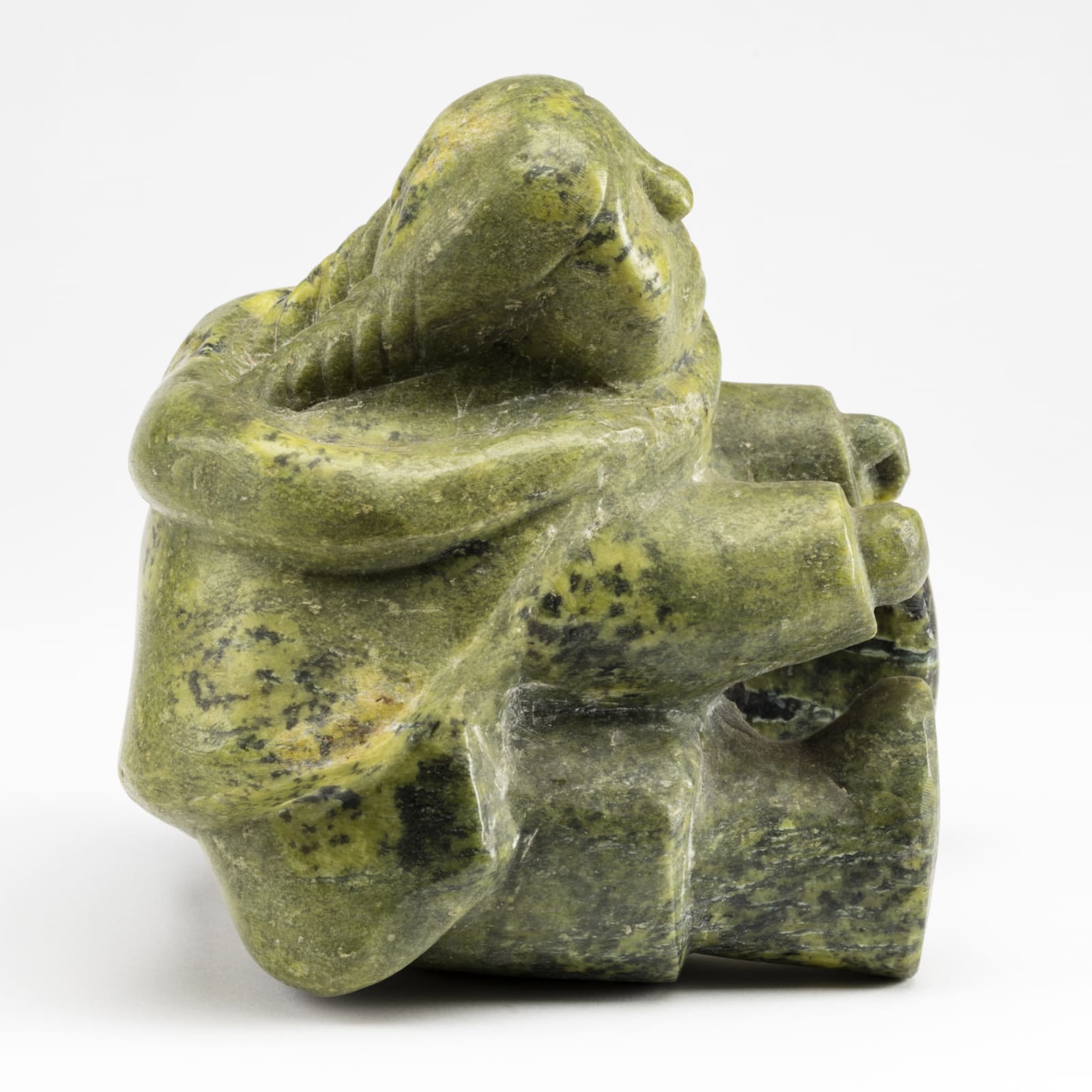 AQJANGAJUK SHAA, R.C.A. (1937-2019) KINNGAIT (CAPE DORSET), Seated Woman, early 1960s