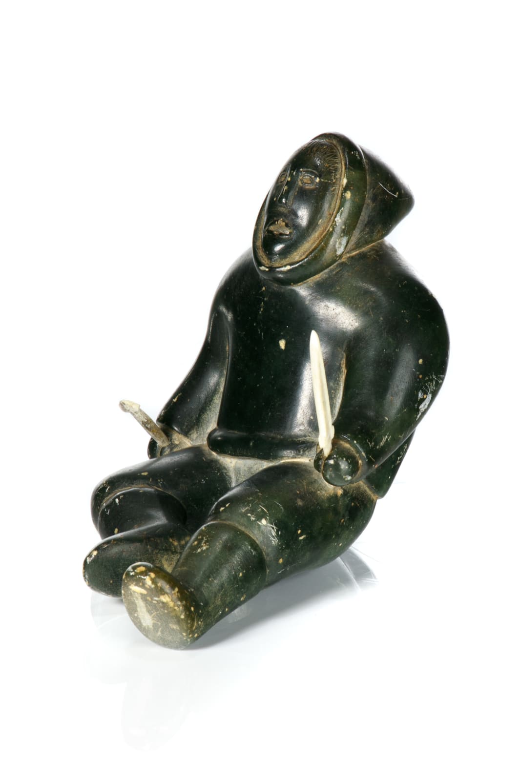 UNIDENTIFIED ARTIST, INUKJUAK (PORT HARRISON), Seated Hunter with Arrow and Knife, late 1950s