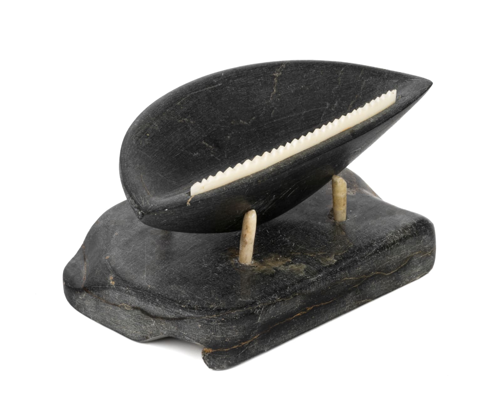 UNIDENTIFIED INUIT ARTIST, EASTERN CANADIAN ARCTIC, Model Qulliq (Kudlik) on Base, late 1950s / early 1960s