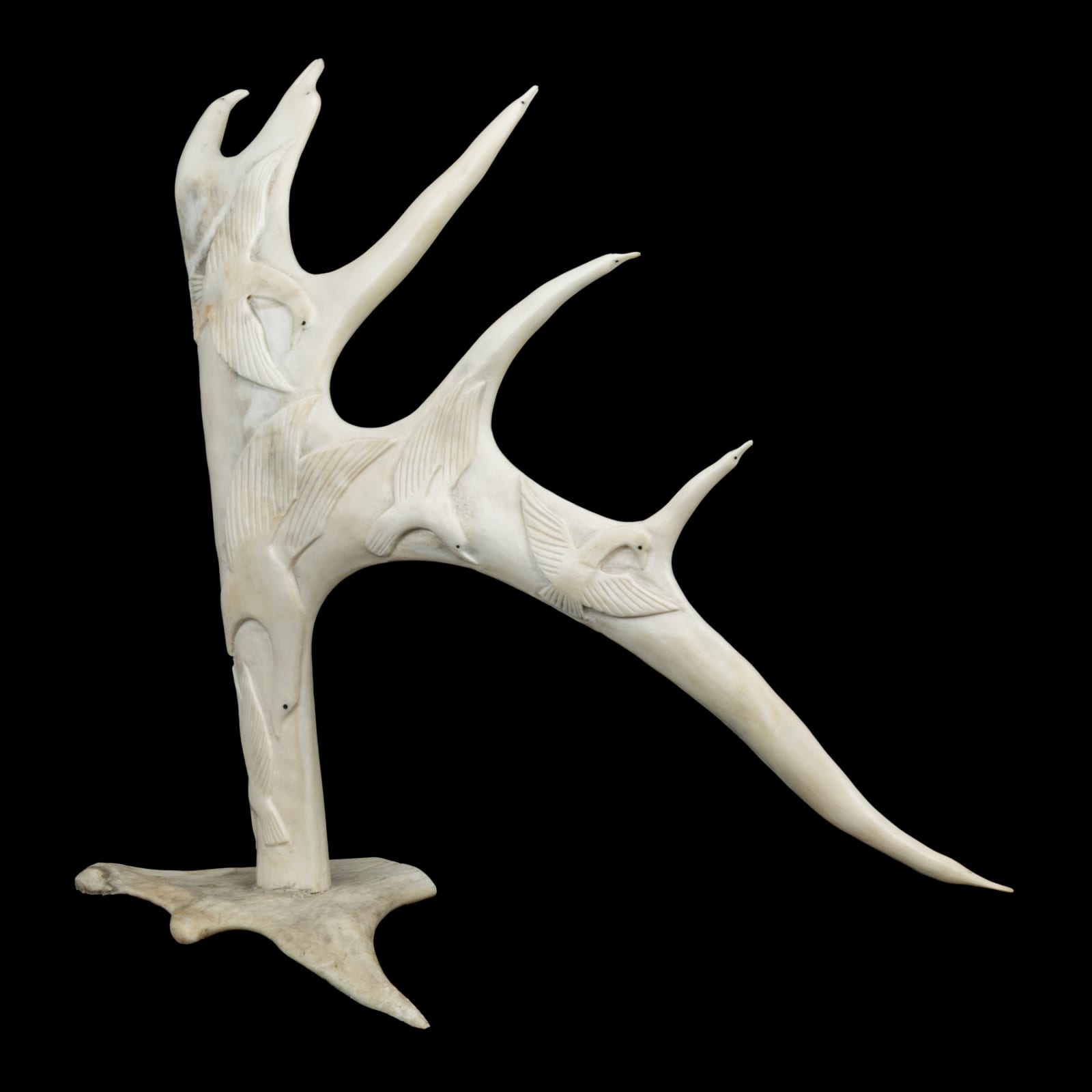 YASSIE DANIALEE KAKEE (1947-) IQALUIT (FROBISHER BAY), Still Flight (Birds in Relief on Antler), c. 1990s