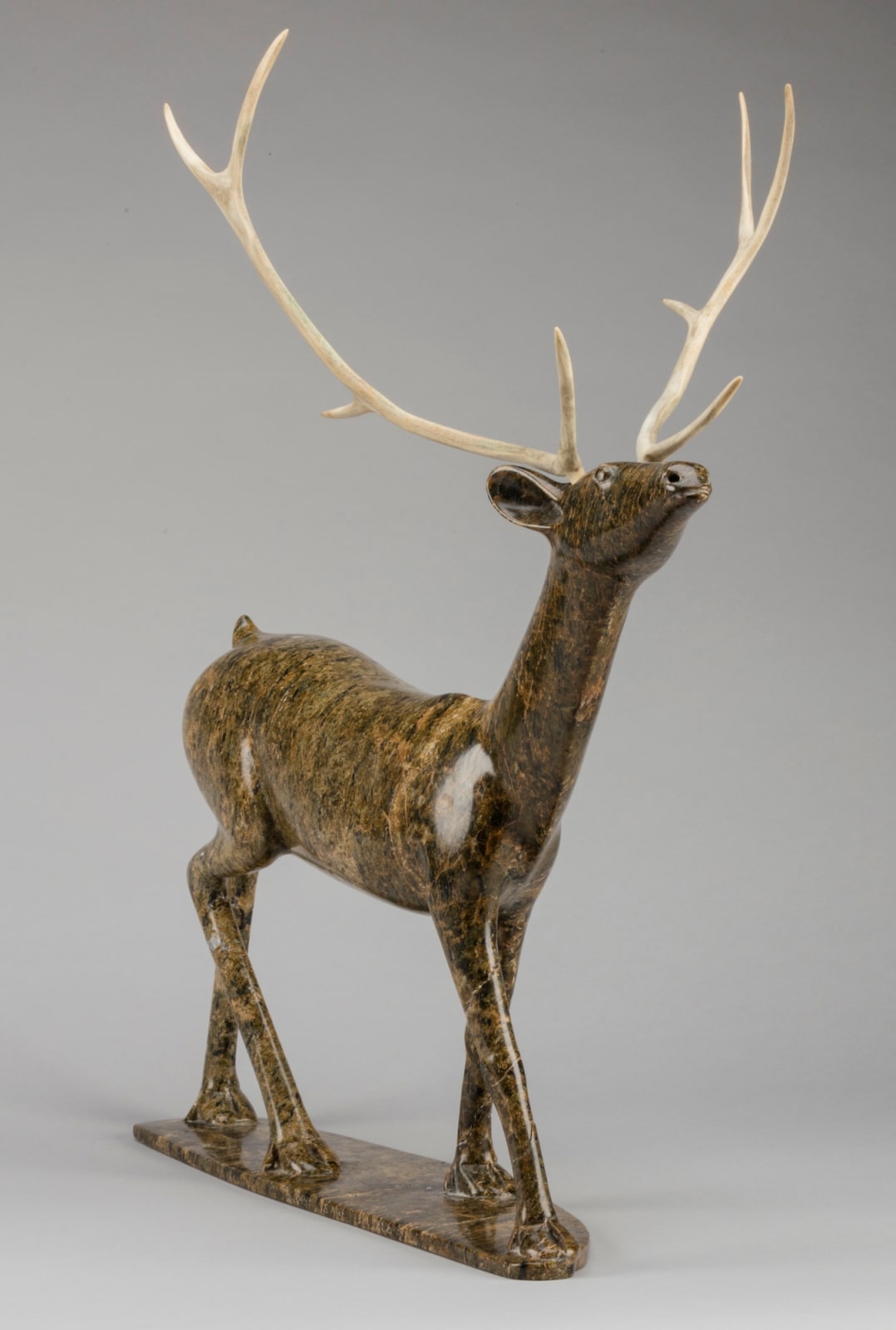 OSUITOK IPEELEE, R.C.A. (1922 or 1923-2005) KINNGAIT (CAPE DORSET, Walking Caribou, c. 1987-88