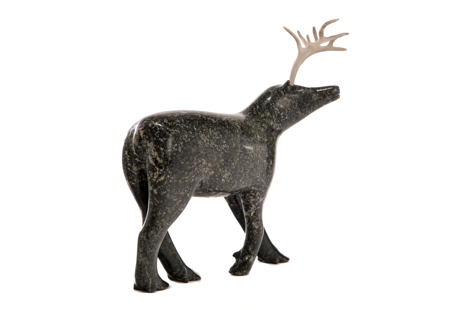 PITSEOLAK NIVIAQSI R.C.A. (1947-2015) KINNGAIT (CAPE DORSET), Strutting Caribou, late 1990s
