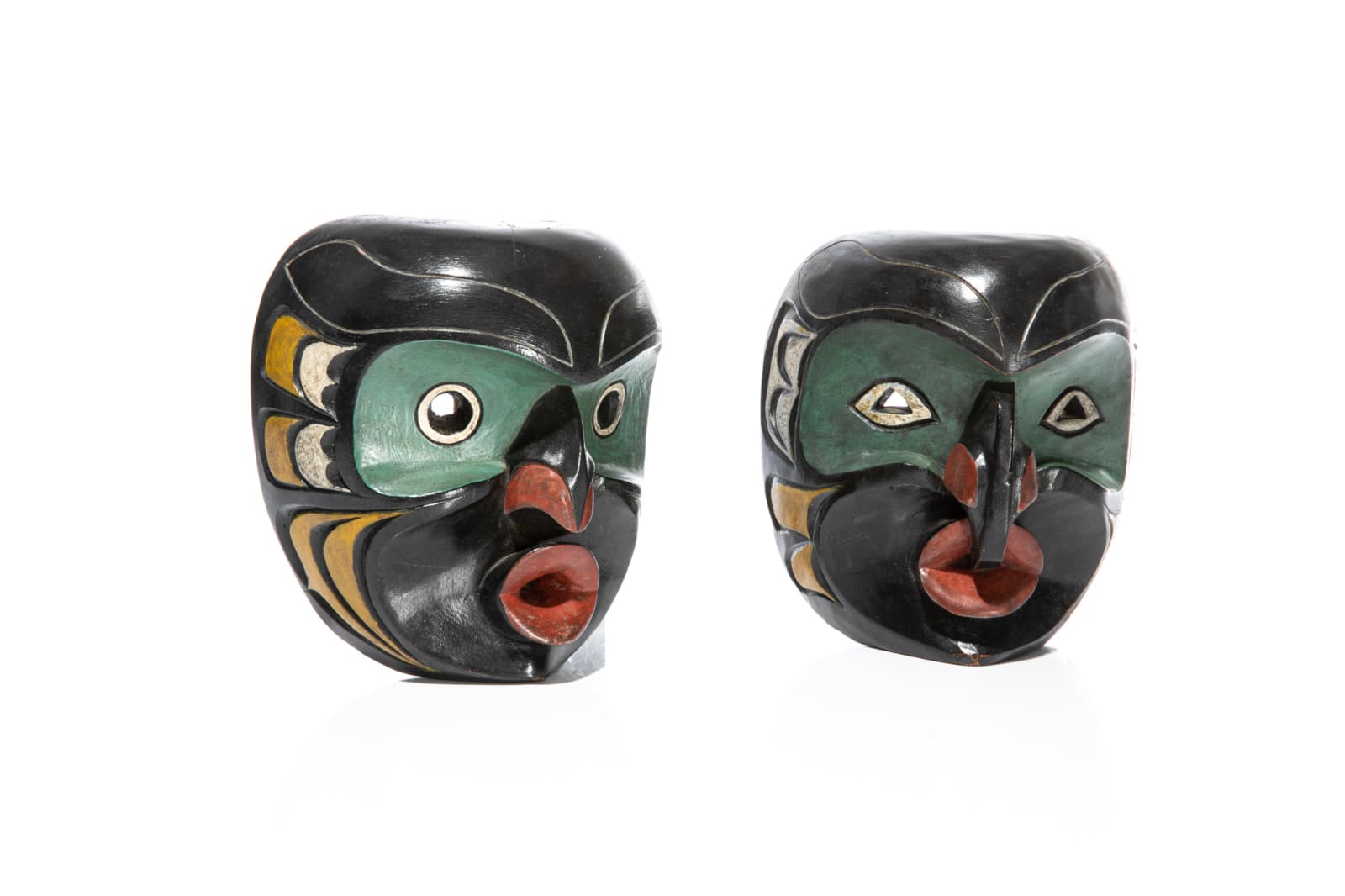 LLOYD WADHAMS SR. (1938-1992) TLAWITSIS (KALUGWIS), Wild Woman ( (Dzoonakwa) and Man Masks, late 1960s