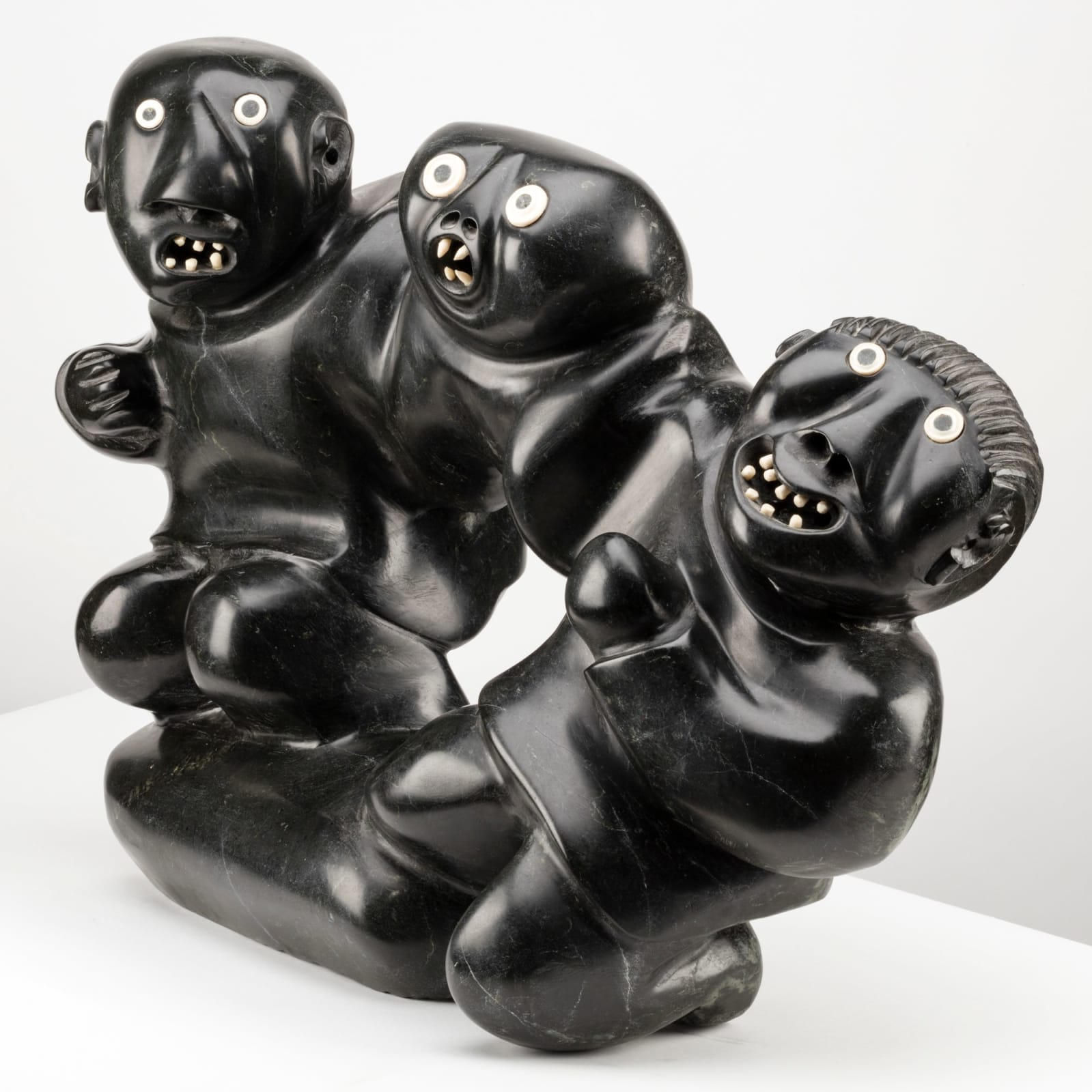 JUDAS ULLULAQ (1937-1999), UQSUQTUUQ (GJOA HAVEN), Men Tugging at an Owl Spirit, c. 1988-89