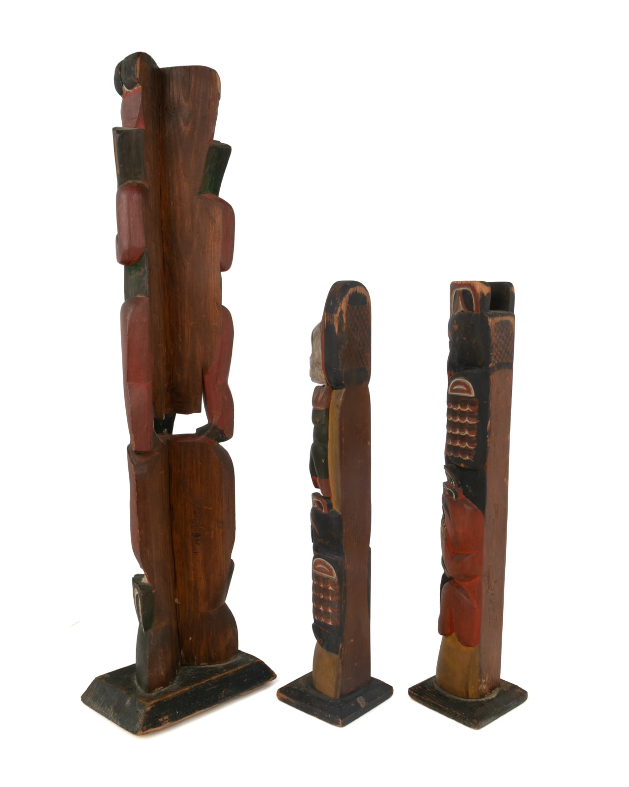 ALBERT BERRY SHOP CARVER / UNIDENTIFIED TLINGIT ARTIST, Three Works: Two Divided Raven Totem (Kiks.ádi) Model Poles and One Strongman Splitting a Sea Lion, before 1909