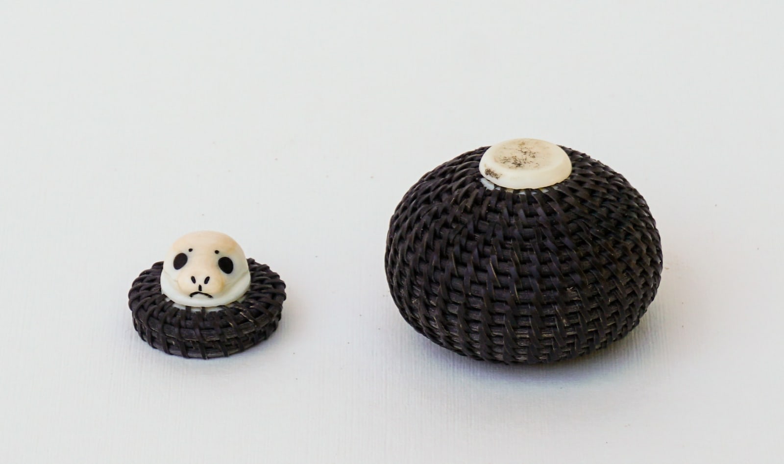 SHELDON BOGENRIFE (1953-) INUPIAQ, WAINWRIGHT, ALASKA, Basket with Seal Knob, 1980s