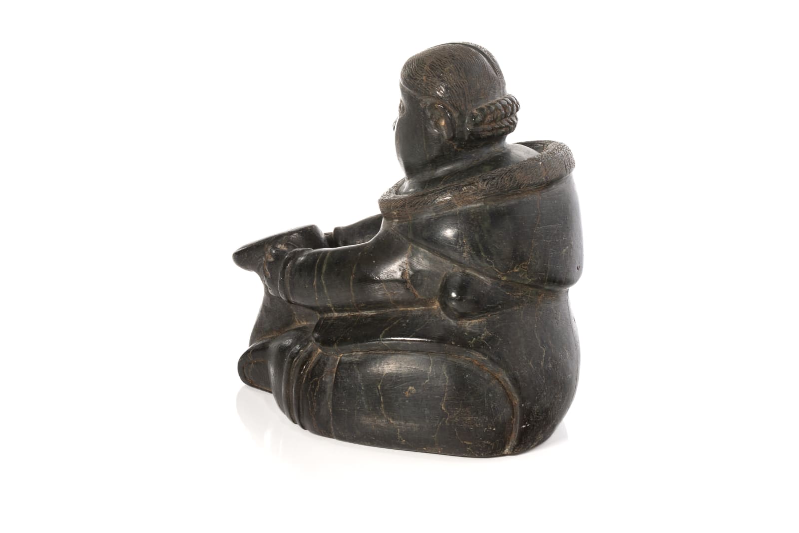 SARAH NASTAPOKA (1925- ) INUKJUAK (PORT HARRISON), Seated Woman, Mending a Kamik, c. 1960