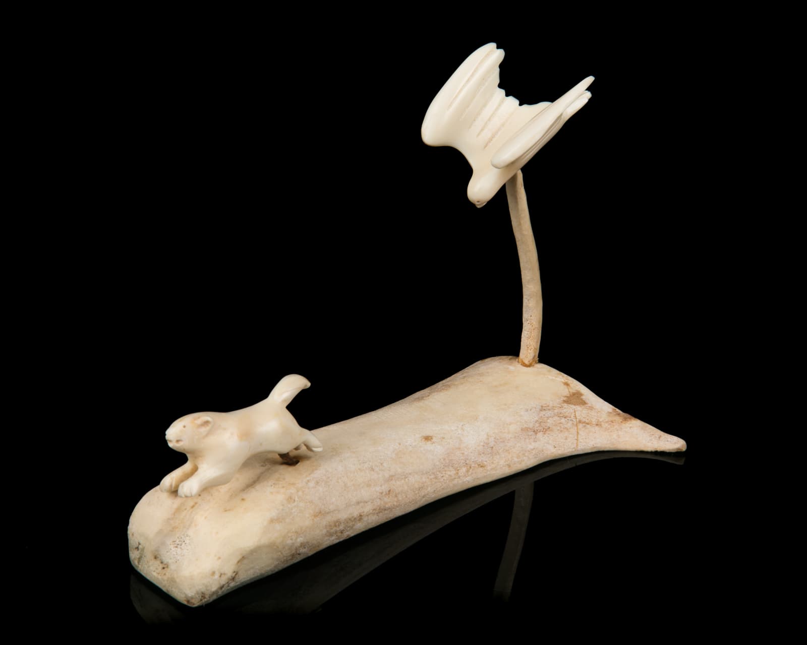 SOLOMON IQQUIYUITUQ (1946-) KUGAARUK (PELLY BAY), Hawk in Pursuit of a Lemming , 1970s