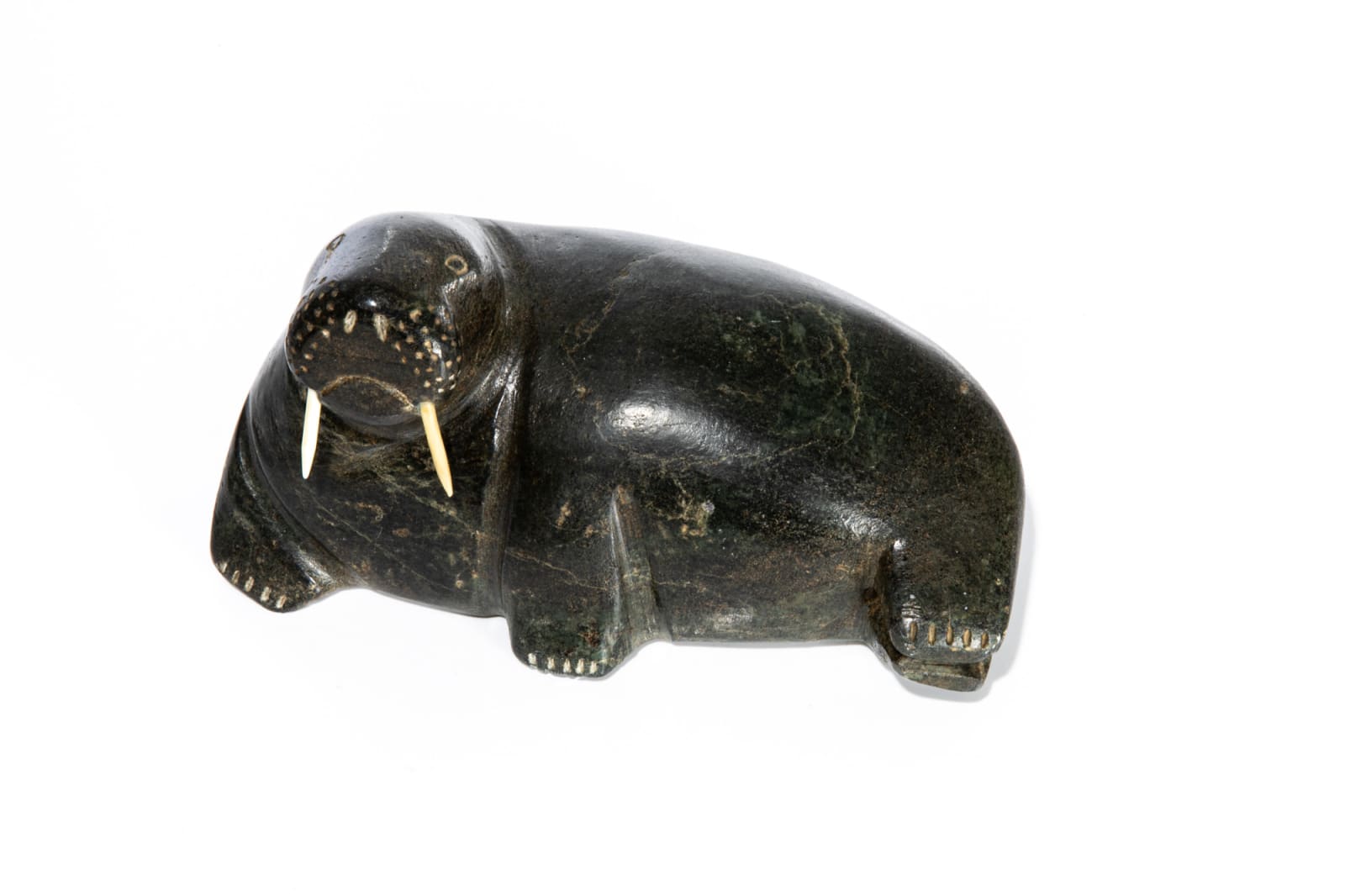 UNIDENTIFIED ARTIST, NUNAVIK (ARCTIC QUEBEC), Lounging Walrus, c. 1950s