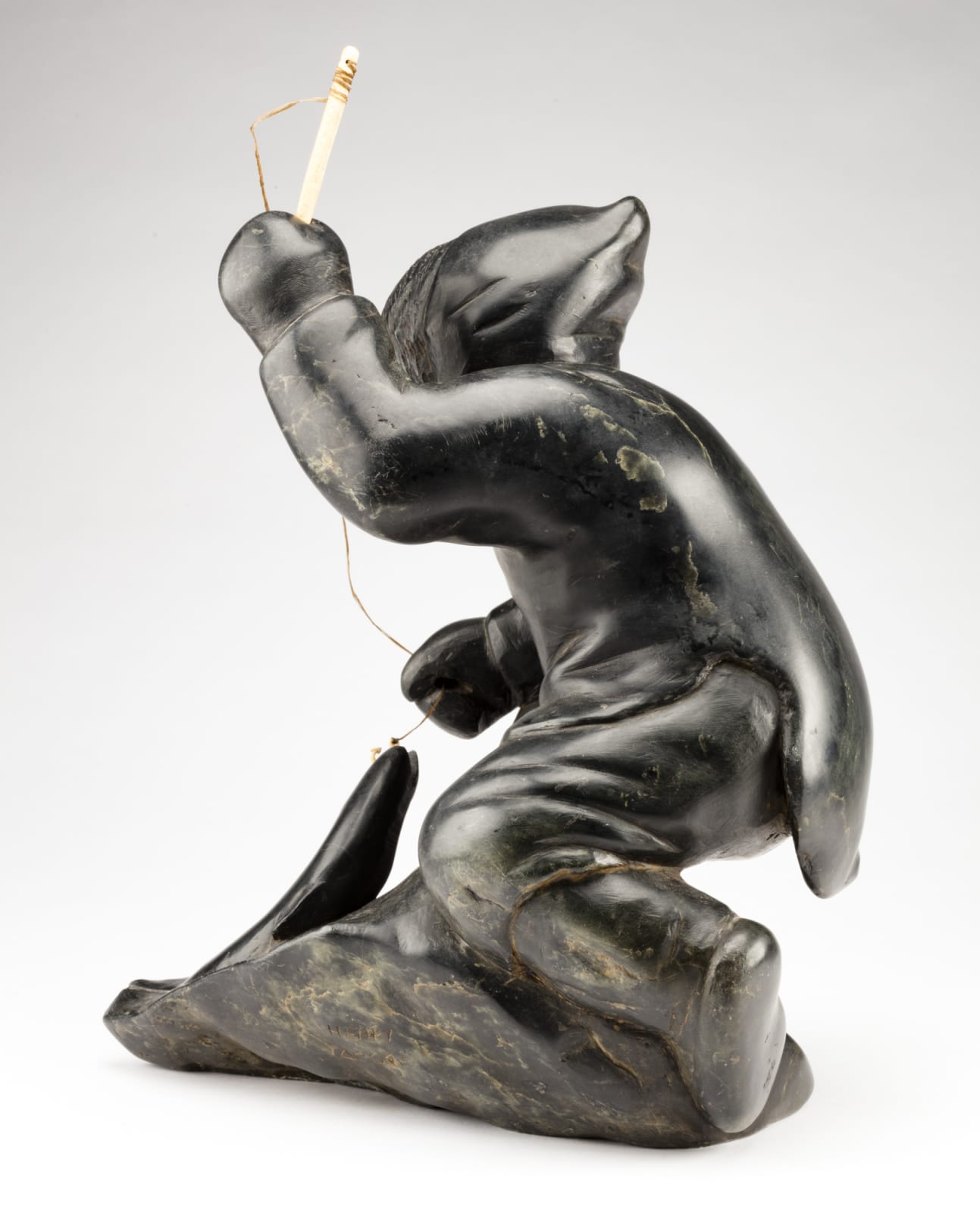 HENRY EVALUARDJUK (1923-2007) IQALUIT (FROBISHER BAY), Fisherman, c. 1963-4