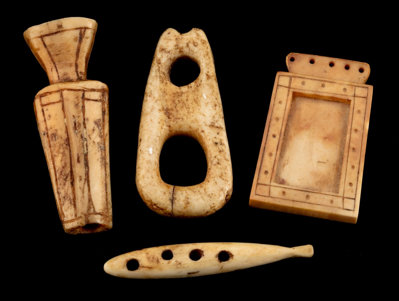 HISTORIC PERIOD INUIT OR POSSIBLY THULE CULTURE MAKERS, Implements and Amulets, c. 19th century or earlier
