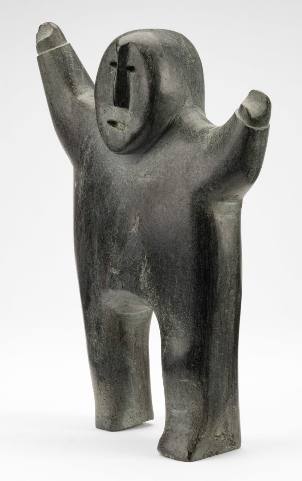 PETER INUKSHUK (1896-1975) QAMANI’TUAQ (BAKER LAKE), Man Signalling Caribou Sighting, c. 1970