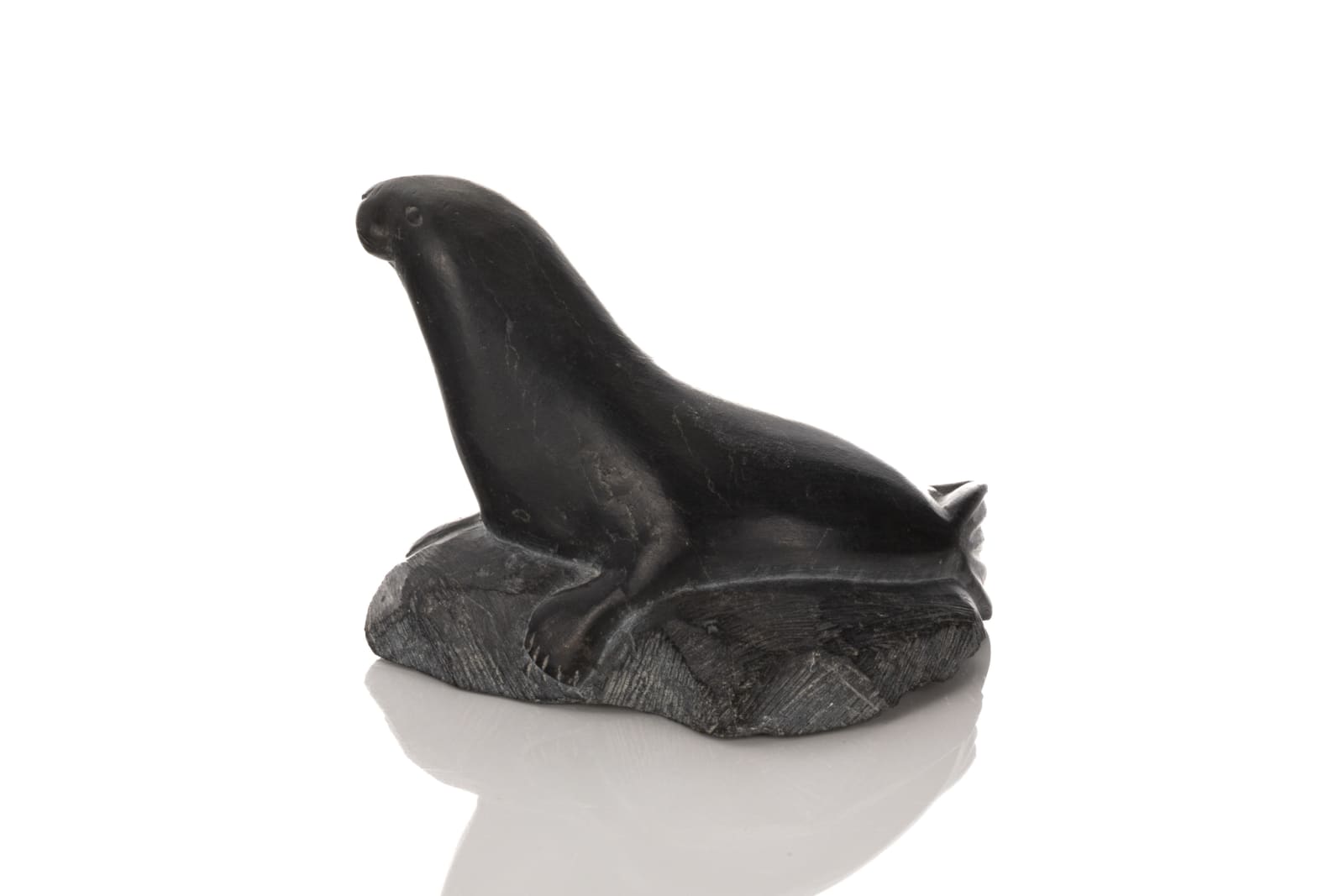 LUCASSIE ECHALOOK (1942-) INUKJUAK (PORT HARRISON), Lounging Seal, mid-late 1970s