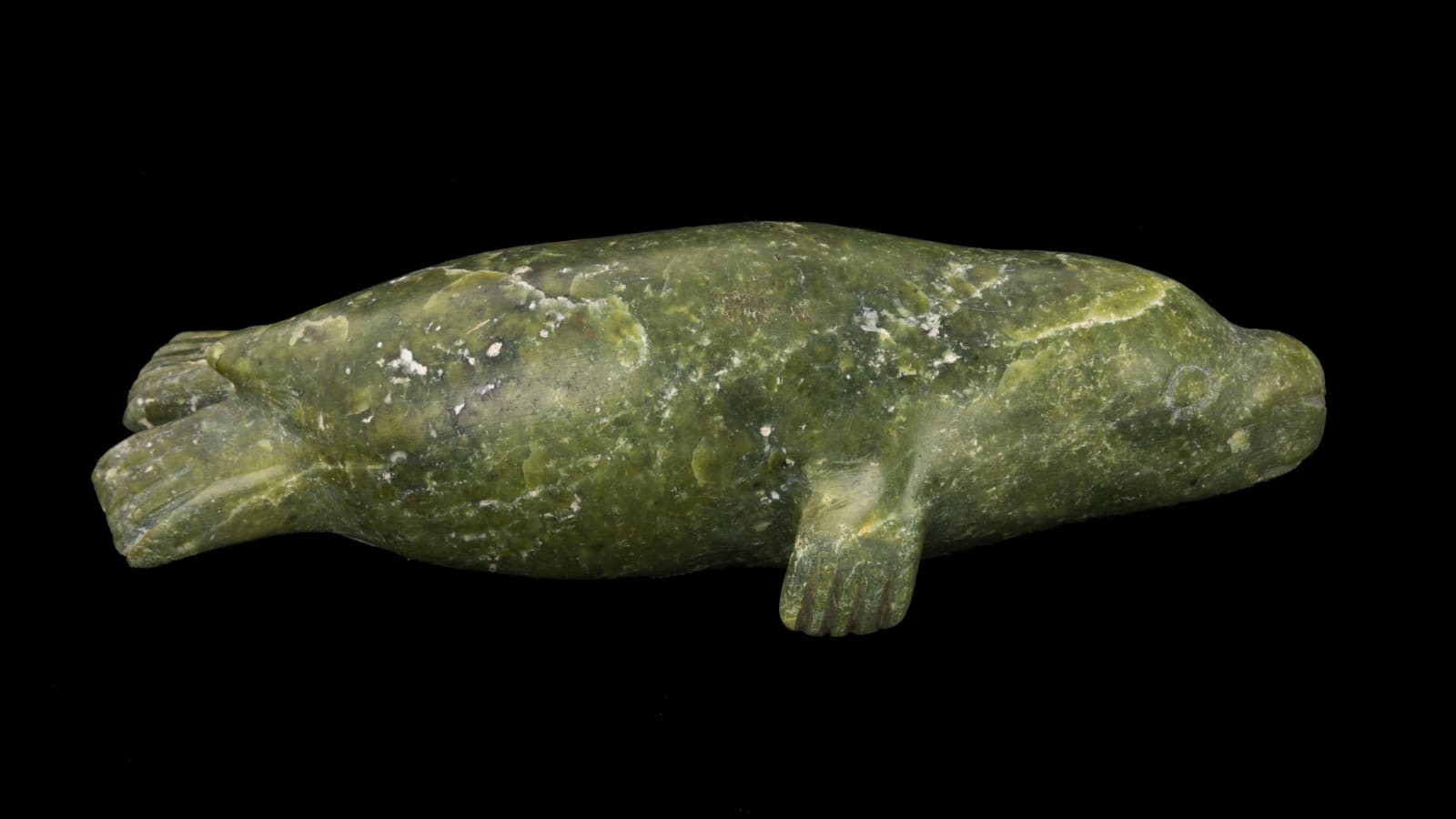 KEELEEMEEOOMEE SAMUALIE (1919-1983) KINNGAIT (CAPE DORSET), Swimming Seal, 1980s