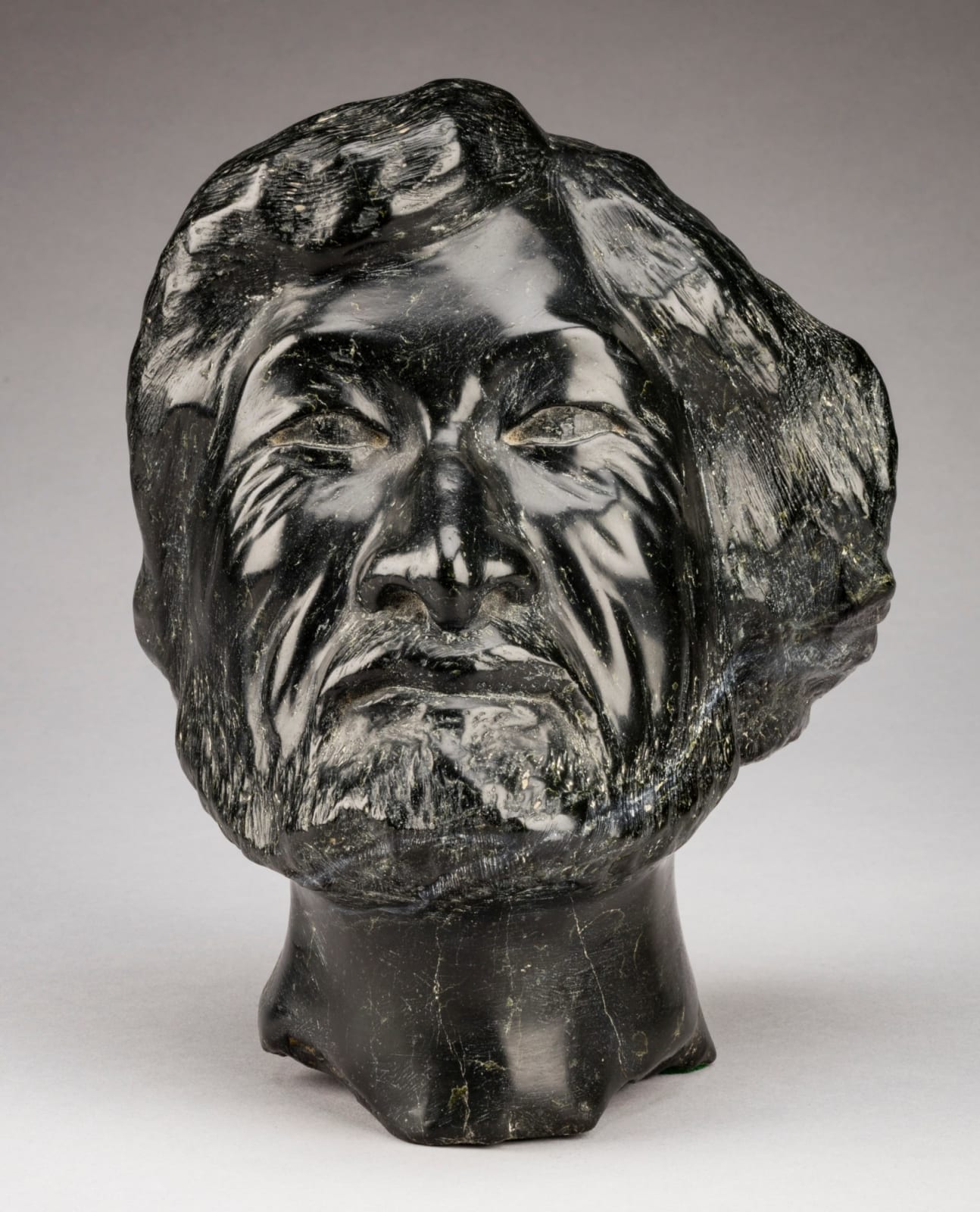 HENRY EVALUARDJUK (1923-2007) IQALUIT (FROBISHER BAY), Head of a Man (Self Portrait), probably early-mid 1980s