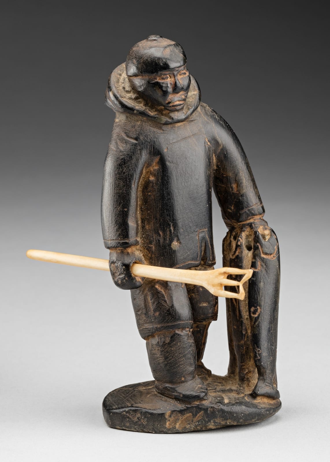 ENNUTSIAK (1893-1967) IQALUIT (FROBISHER BAY), Kakivak Fisherman with Catch,, early 1960s