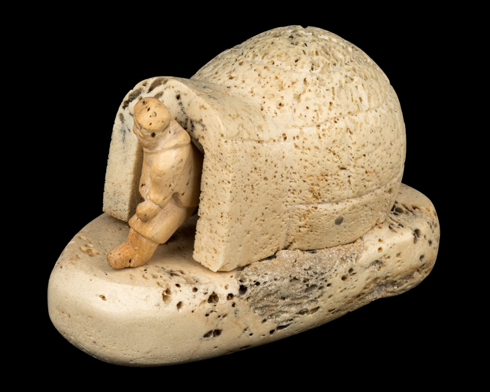 Probably IRENE KATAQ ANGUTITOK (1914-1971) NAUJAAT (REPULSE BAY), Man Exiting a Snowhouse, 1961